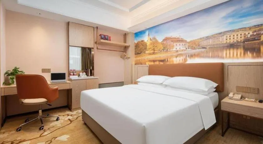 Bed in Vienna Hotel Hubei Macheng Cultural Town
