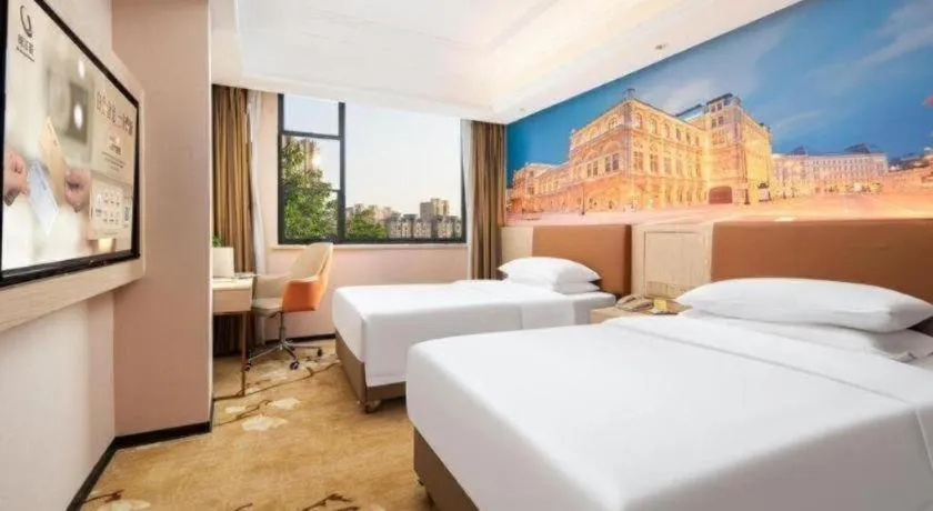 Bed in Vienna Hotel Hubei Macheng Cultural Town