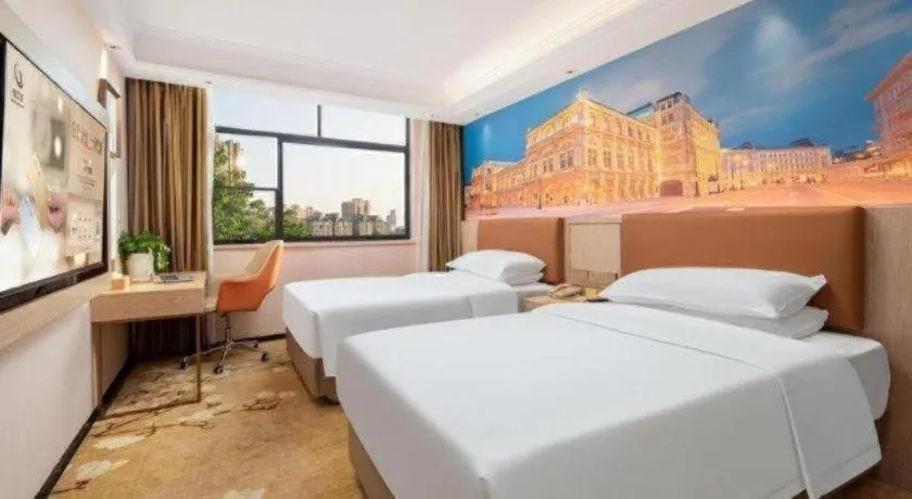 Bed in Vienna Hotel Hubei Macheng Cultural Town
