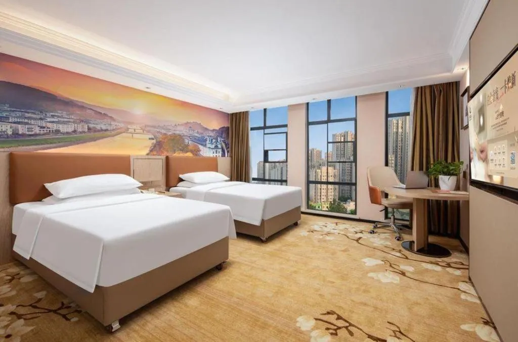 Bed in Vienna Hotel Hubei Macheng Cultural Town