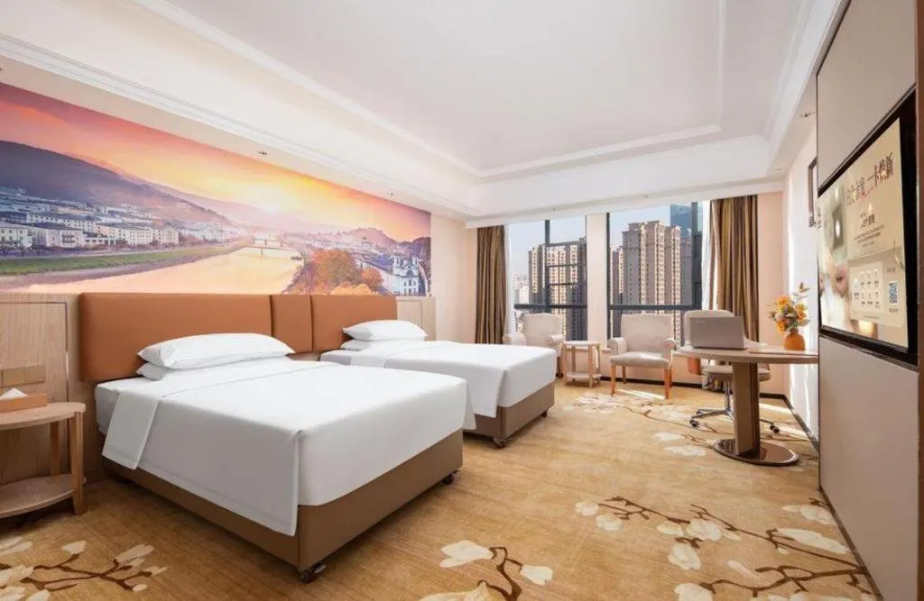 Bed in Vienna Hotel Hubei Macheng Cultural Town