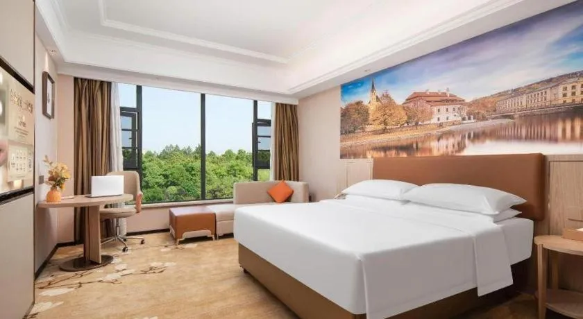 Bed in Vienna Hotel Hubei Macheng Cultural Town