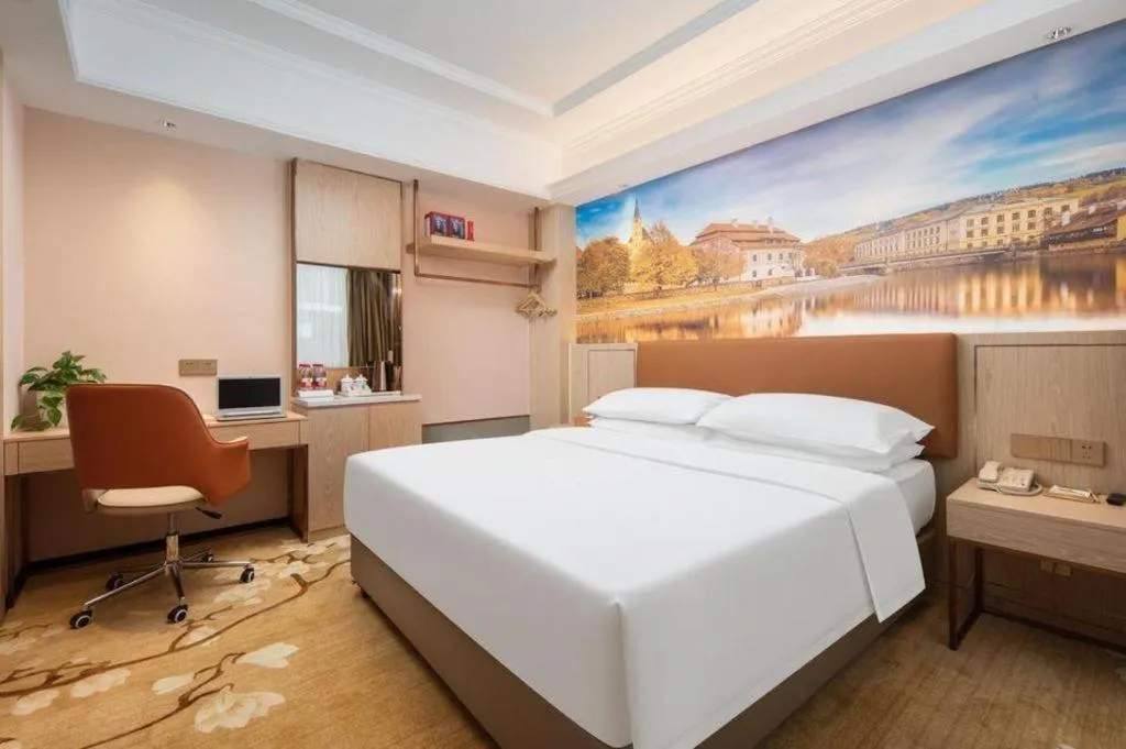 Bed in Vienna Hotel Hubei Macheng Cultural Town