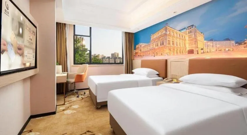 Bed in Vienna Hotel Hubei Macheng Cultural Town