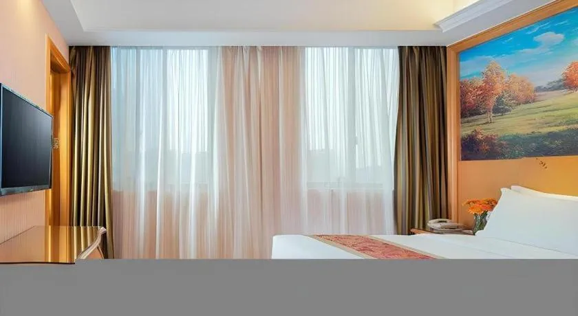 Bed in Vienna Hotel Hubei Macheng Cultural Town