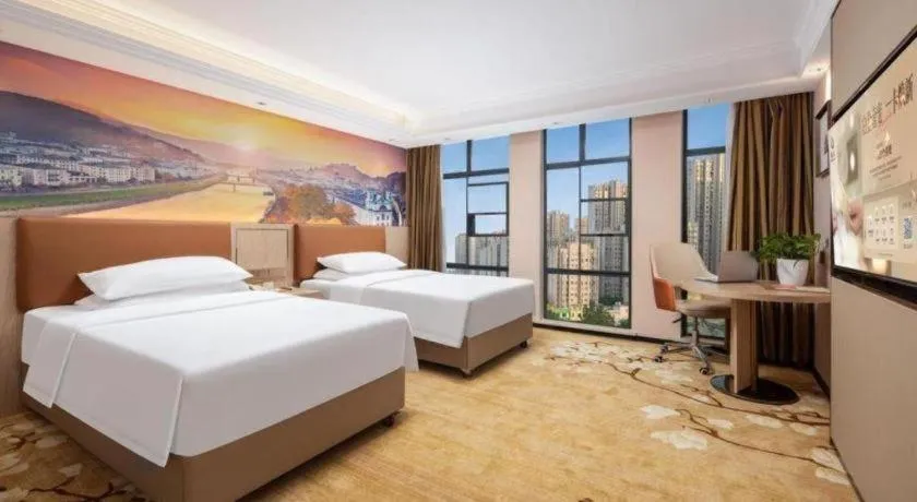 Bed in Vienna Hotel Hubei Macheng Cultural Town