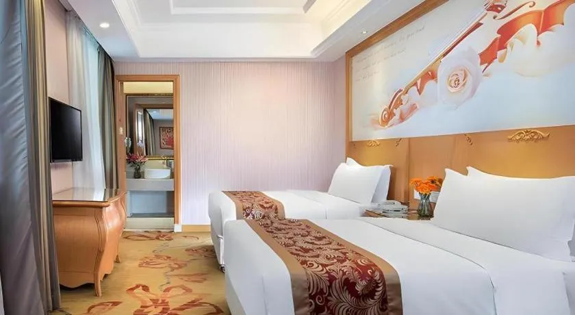 Bed in Vienna Hotel Hubei Macheng Cultural Town