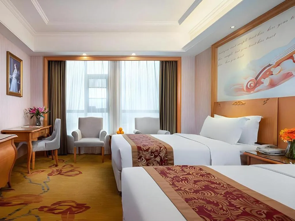 Bed in Vienna Hotel Hubei Macheng Cultural Town