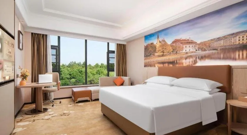 Bed in Vienna Hotel Hubei Macheng Cultural Town