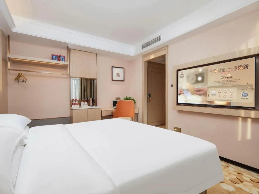 Bed in Vienna Hotel Hubei Macheng Cultural Town