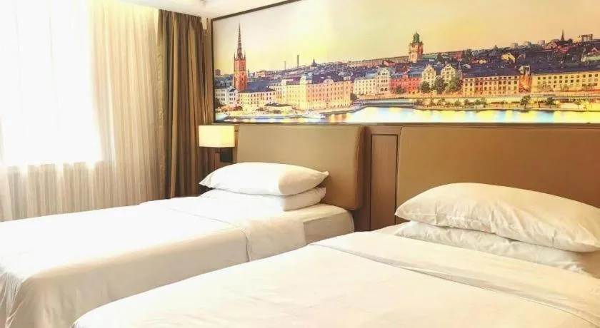 Bed in Vienna Hotel Hunan Hengyang Leiyang