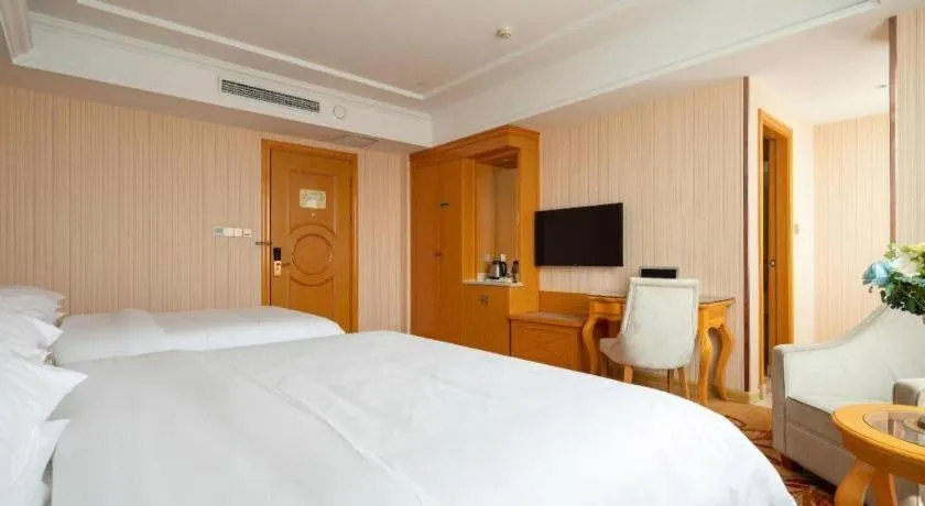 Bed in Vienna Hotel Tianjin 5th Avenue Youyi Road Cultural Center Metro Station