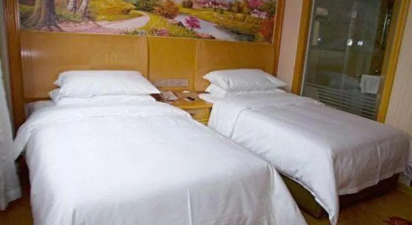 Bed in Vienna Hotel Tianjin 5th Avenue Youyi Road Cultural Center Metro Station