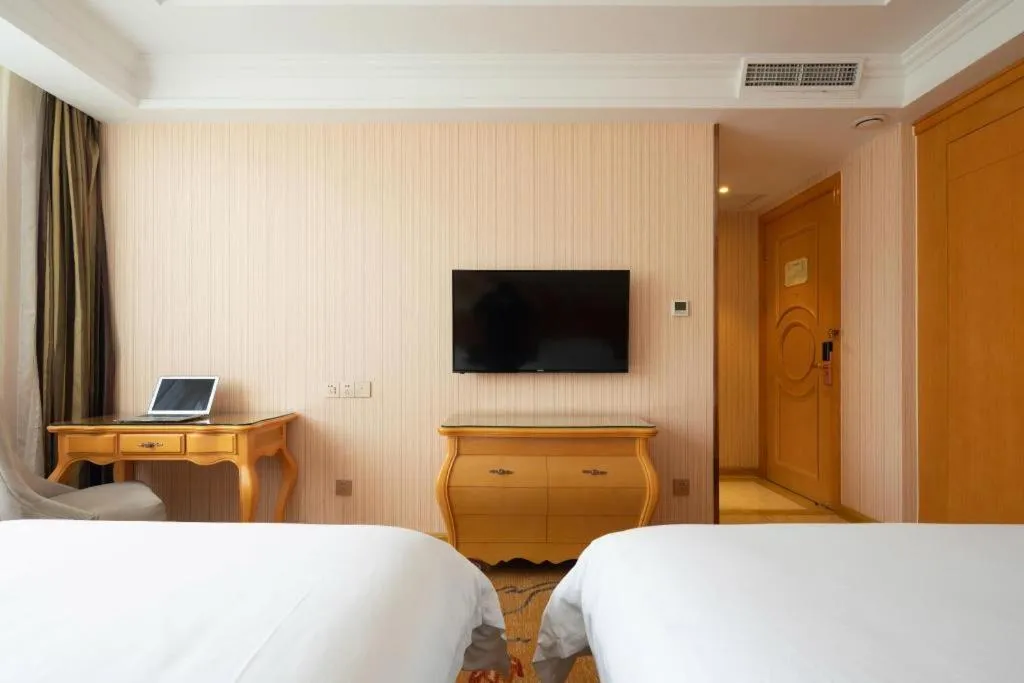 Bed in Vienna Hotel Tianjin 5th Avenue Youyi Road Cultural Center Metro Station