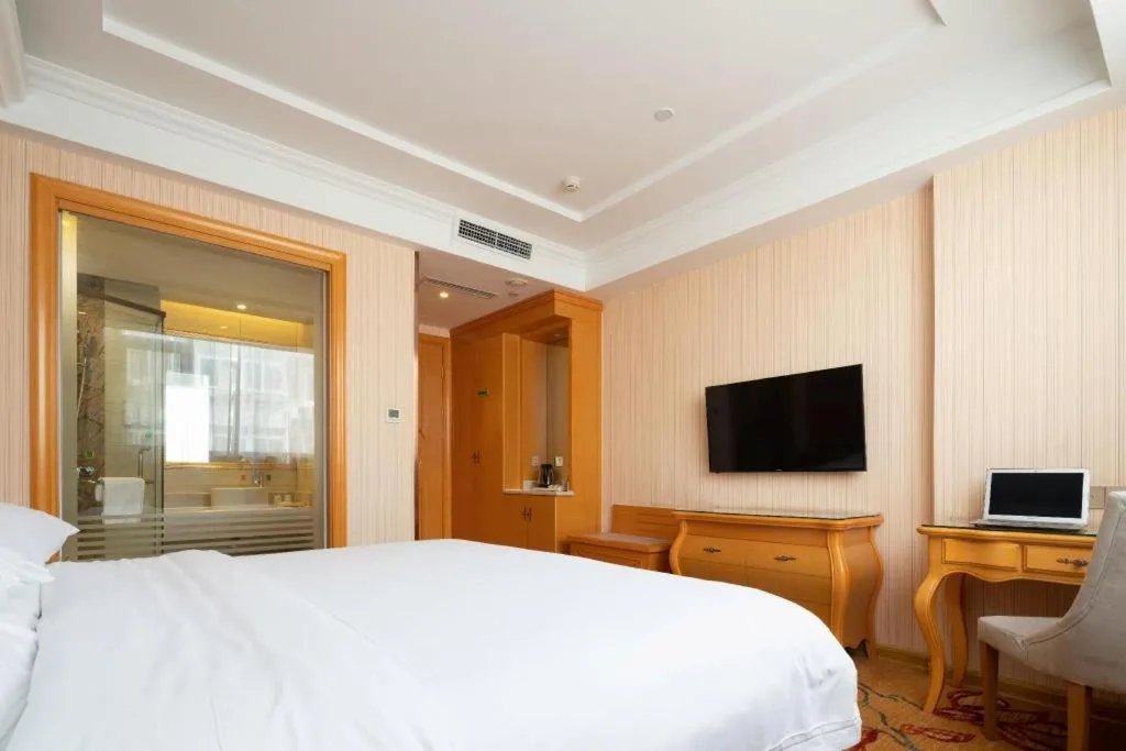 Bed in Vienna Hotel Tianjin 5th Avenue Youyi Road Cultural Center Metro Station