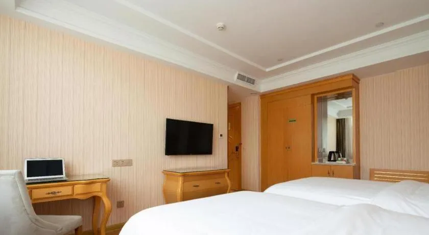 Bed in Vienna Hotel Tianjin 5th Avenue Youyi Road Cultural Center Metro Station