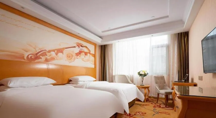Bed in Vienna Hotel Tianjin 5th Avenue Youyi Road Cultural Center Metro Station