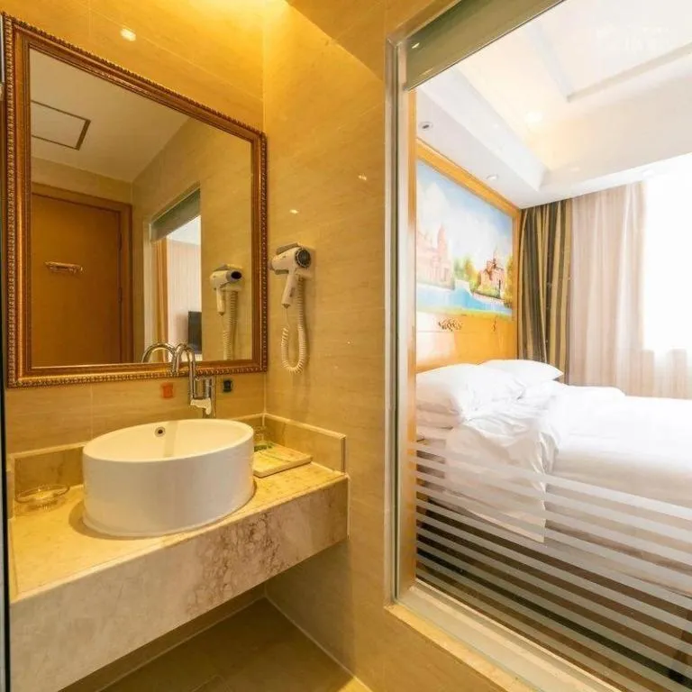 Bed in Vienna Hotel Tianjin 5th Avenue Youyi Road Cultural Center Metro Station