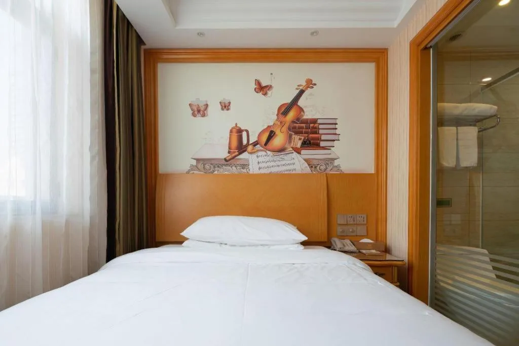 Bed in Vienna Hotel Tianjin 5th Avenue Youyi Road Cultural Center Metro Station