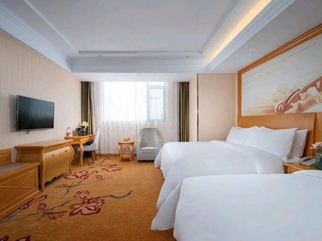 Bed in Vienna Hotel Tianjin 5th Avenue Youyi Road Cultural Center Metro Station