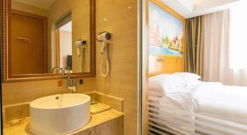 Bed in Vienna Hotel Tianjin 5th Avenue Youyi Road Cultural Center Metro Station