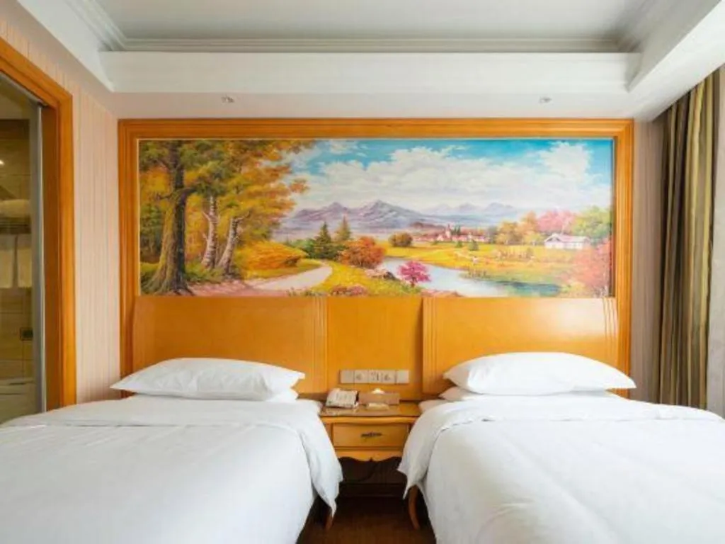 Bed in Vienna Hotel Tianjin 5th Avenue Youyi Road Cultural Center Metro Station