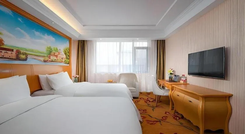 Bed in Vienna Hotel Tianjin 5th Avenue Youyi Road Cultural Center Metro Station