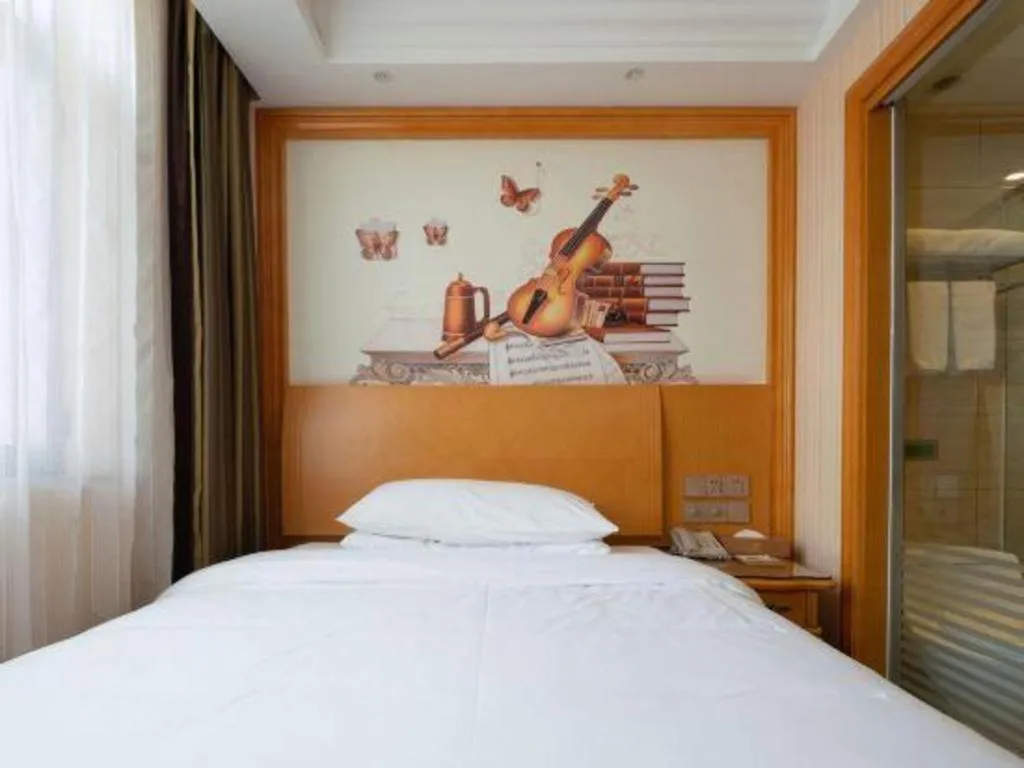 Bed in Vienna Hotel Tianjin 5th Avenue Youyi Road Cultural Center Metro Station