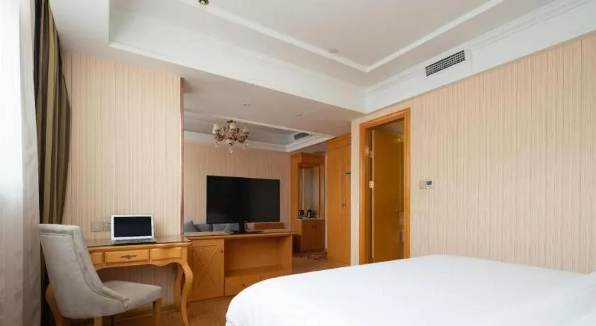 Bed in Vienna Hotel Tianjin 5th Avenue Youyi Road Cultural Center Metro Station