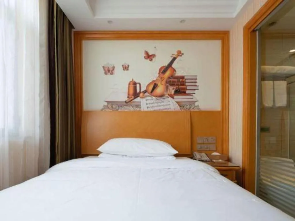 Bed in Vienna Hotel Tianjin 5th Avenue Youyi Road Cultural Center Metro Station