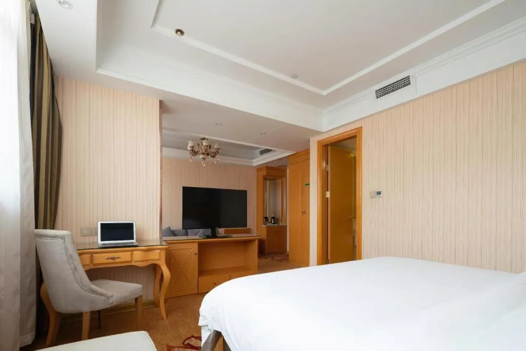 Bed in Vienna Hotel Tianjin 5th Avenue Youyi Road Cultural Center Metro Station