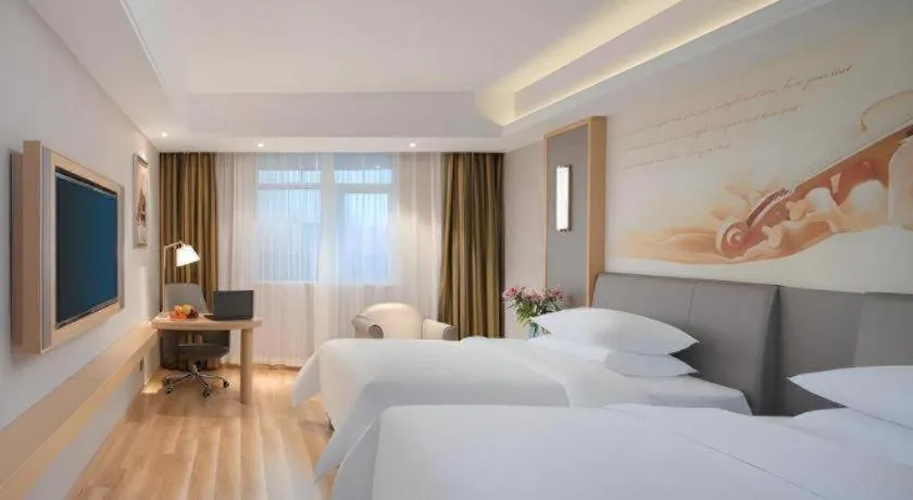 Bed in Vienna Hotel Shanghai Hongqiao Hub National Exhibition Center Huqingping Road