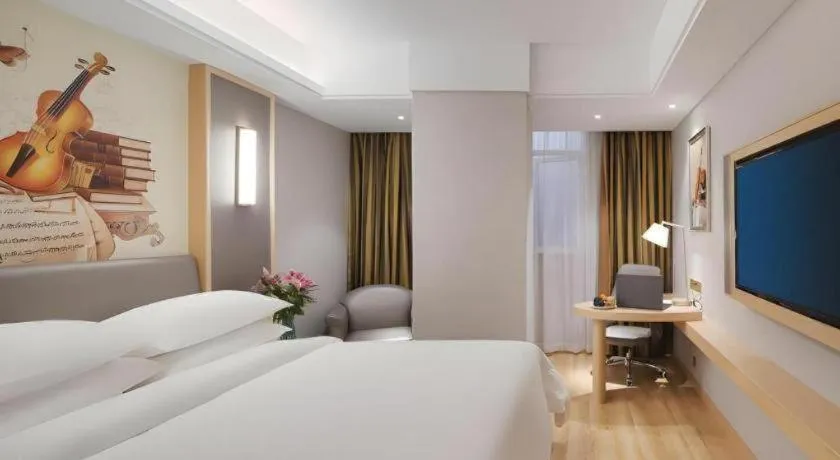 Bed in Vienna Hotel Shanghai Hongqiao Hub National Exhibition Center Huqingping Road