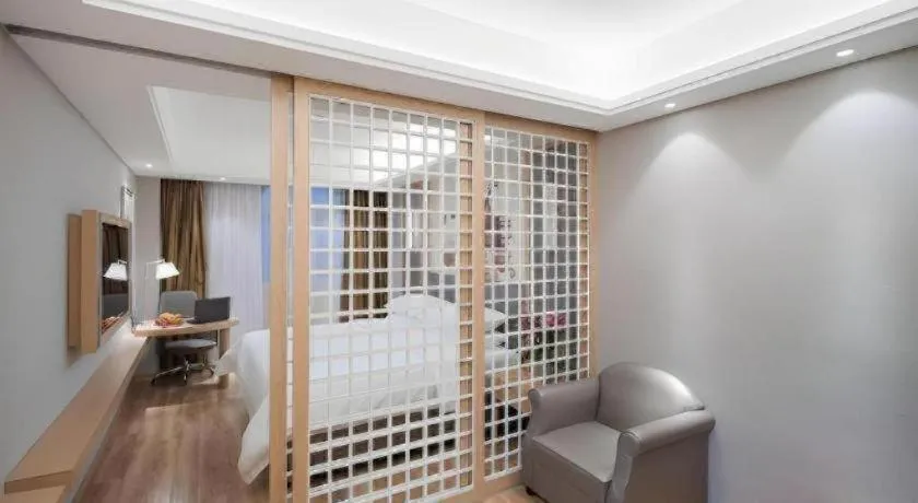 Bed in Vienna Hotel Shanghai Hongqiao Hub National Exhibition Center Huqingping Road