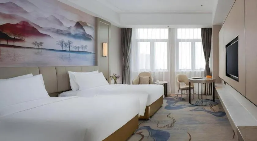 Bed in Venus Royal Hotel Guangdong Zhongshan Dongfeng Center