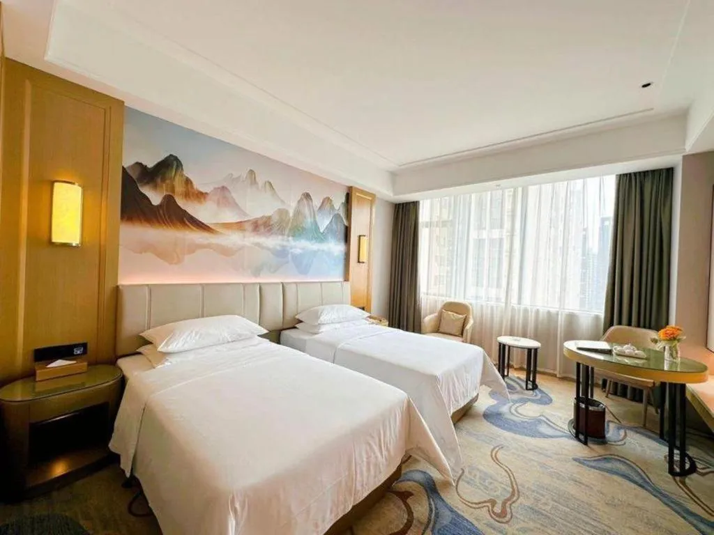 Bed in Venus Royal Hotel Guangdong Zhongshan Dongfeng Center