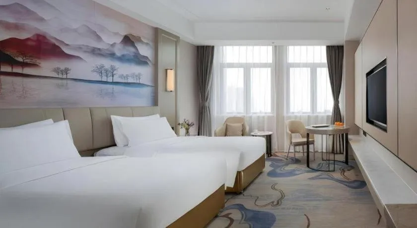 Bed in Venus Royal Hotel Guangdong Zhongshan Dongfeng Center
