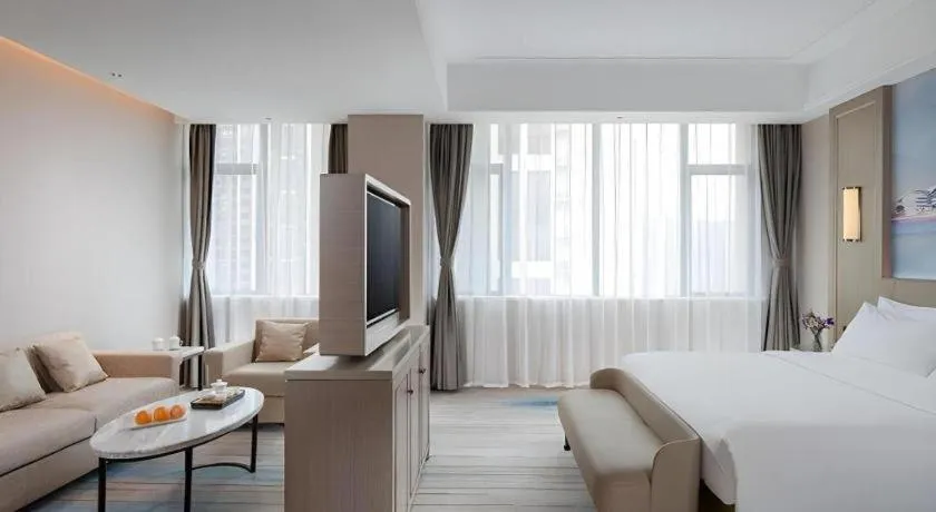 Bed in Venus Royal Hotel Guangdong Zhongshan Dongfeng Center