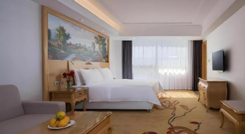Bed in Vienna Hotel Guangdong Huizhou Huabianling Square