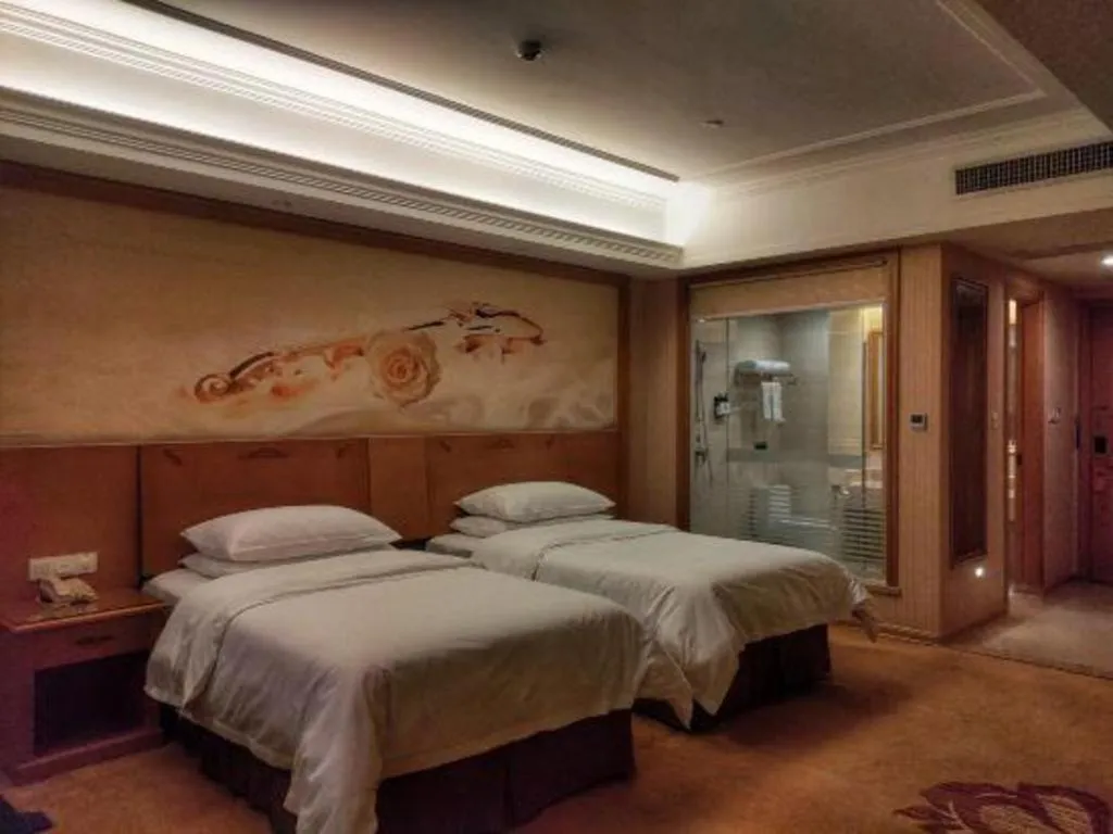 Bed in Vienna Hotel Guangxi Yulin Rong County Guinan Road