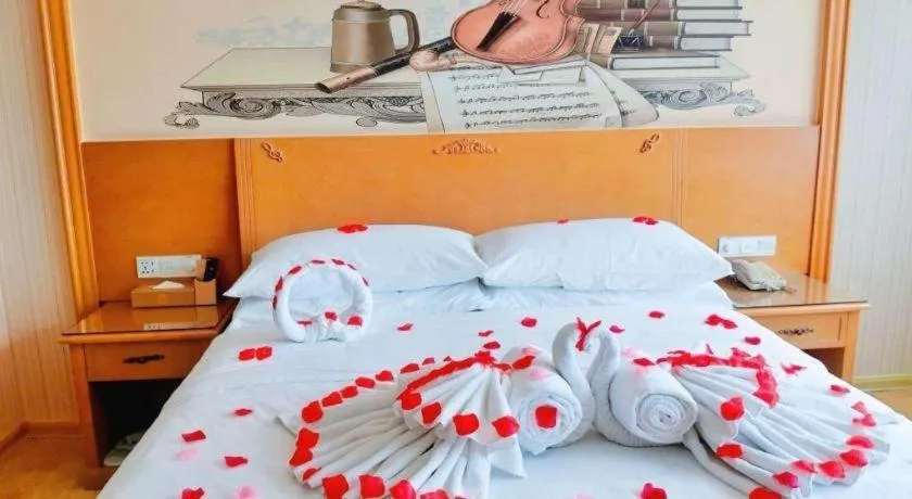 Bed in Vienna Hotel Guangxi Yulin Rong County Guinan Road