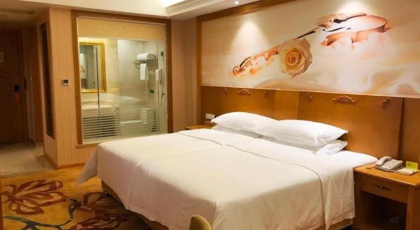 Bed in Vienna Hotel Guangxi Yulin Rong County Guinan Road