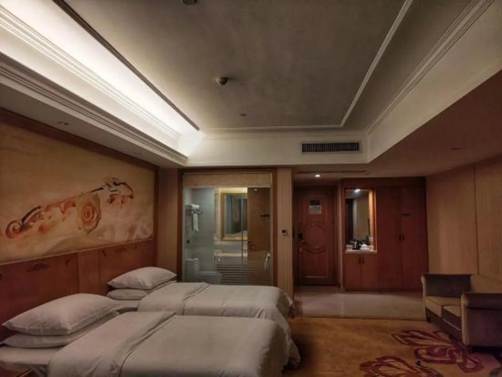 Bed in Vienna Hotel Guangxi Yulin Rong County Guinan Road
