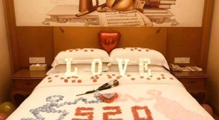 Bed in Vienna Hotel Guangxi Yulin Rong County Guinan Road