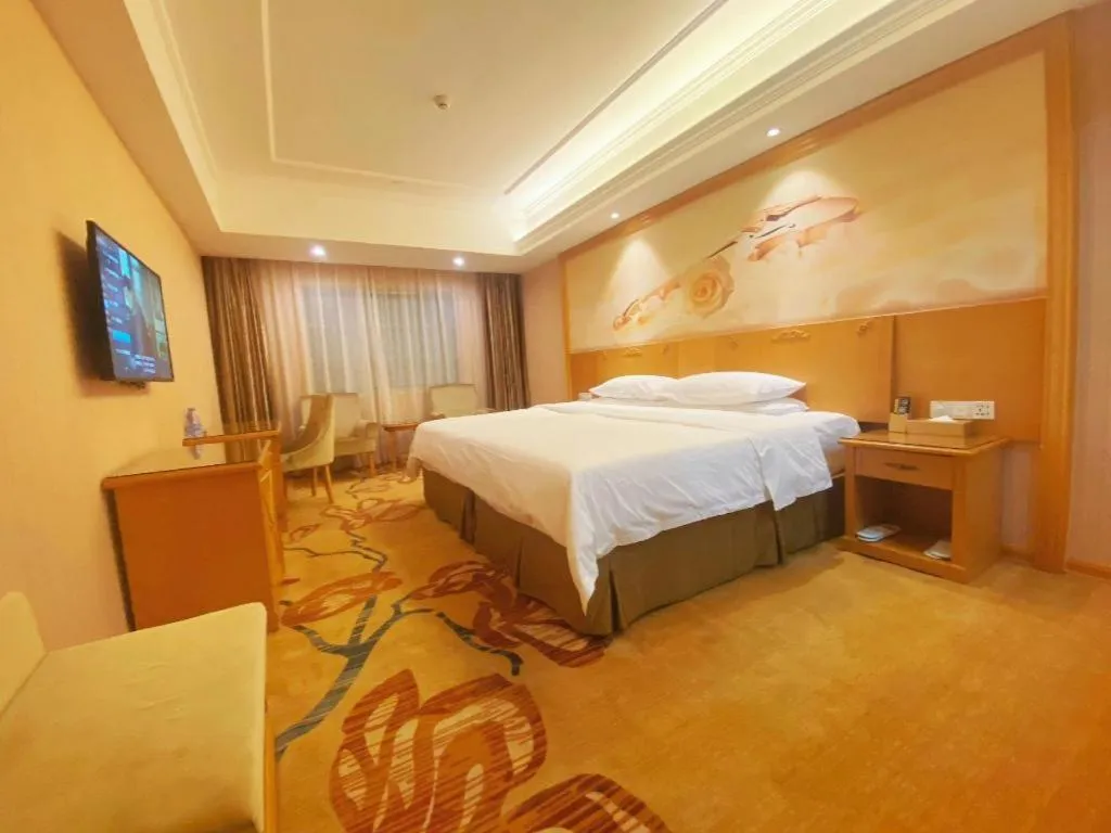 Bed in Vienna Hotel Guangxi Yulin Rong County Guinan Road