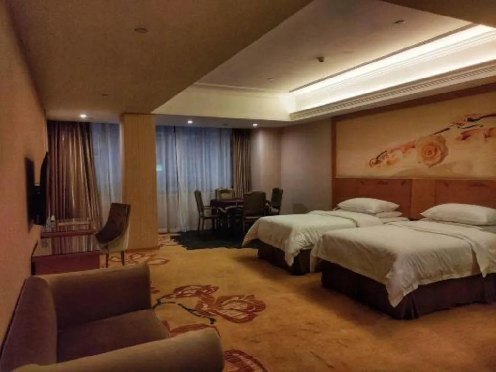 Bed in Vienna Hotel Guangxi Yulin Rong County Guinan Road