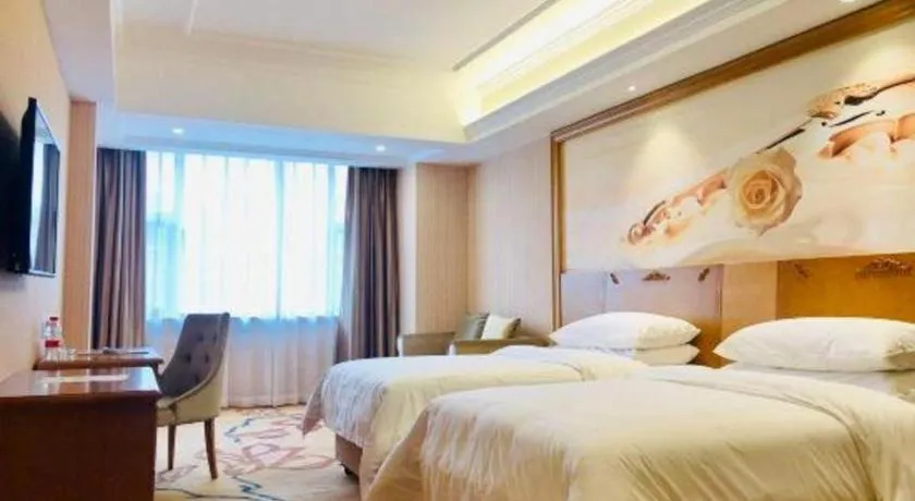 Bed in Vienna Hotel Guangxi Yulin Rong County Guinan Road