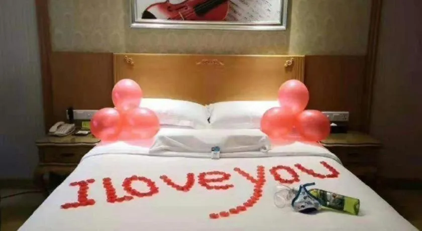 Bed in Vienna Hotel Guangxi Yulin Rong County Guinan Road