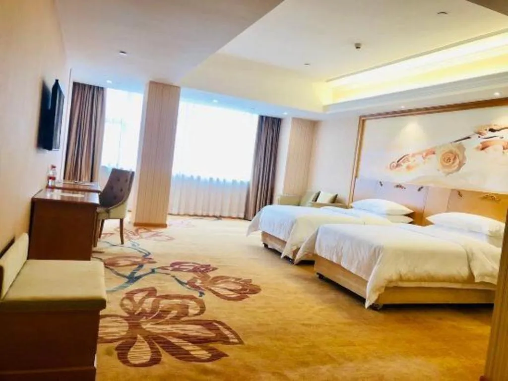 Bed in Vienna Hotel Guangxi Yulin Rong County Guinan Road