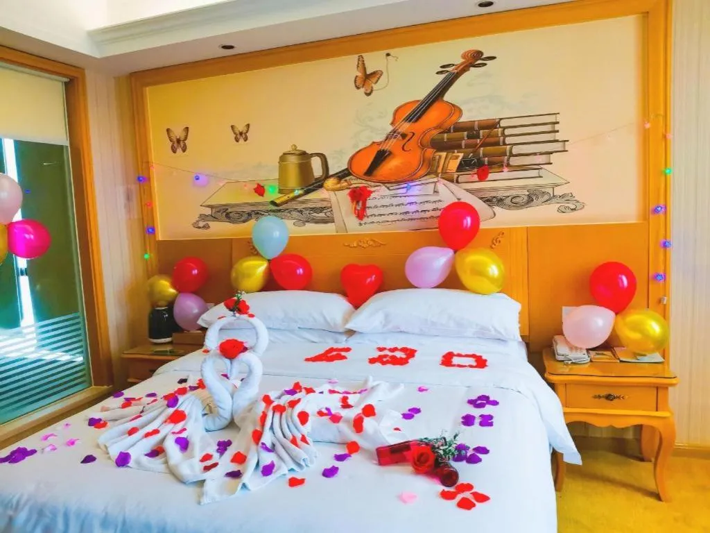 Bed in Vienna Hotel Guangxi Yulin Rong County Guinan Road